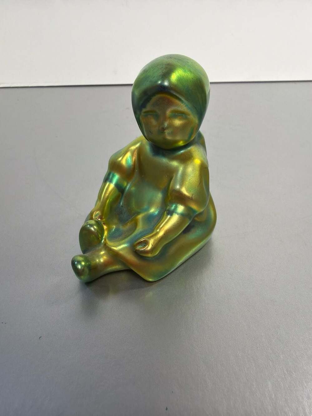 Zsolnay Eosin Iridescent Green Sitting Child Baby Figurine Hungary